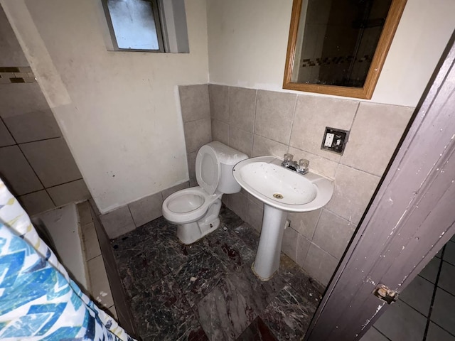 1649 N Latrobe Ave, Chicago, IL 60639 - bathroom featuring tile walls and toilet