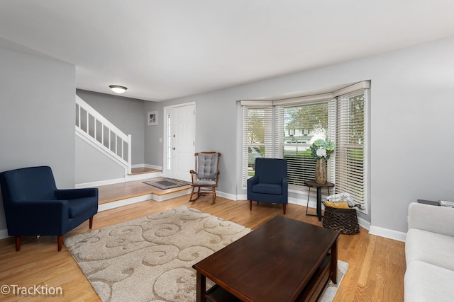 27W137 Chestnut Ln, Winfield, IL 60190 - living area with baseboards, light wood finished floors, and stairs