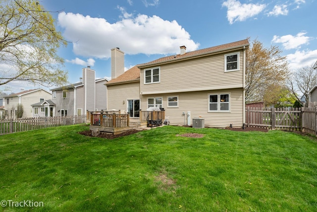 27W137 Chestnut Ln, Winfield, IL 60190 - back of property featuring a chimney, a lawn, a wooden deck, cooling unit, and a fenced backyard