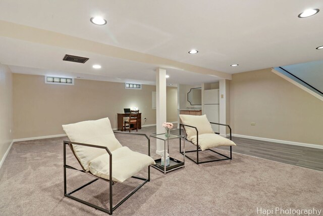 sitting room featuring baseboards, recessed lighting, and carpet floors