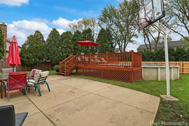 view of patio featuring a deck and outdoor dining area