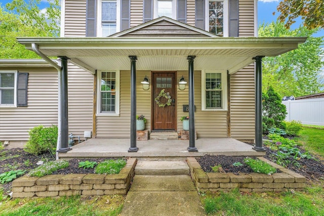 doorway to property with a porch