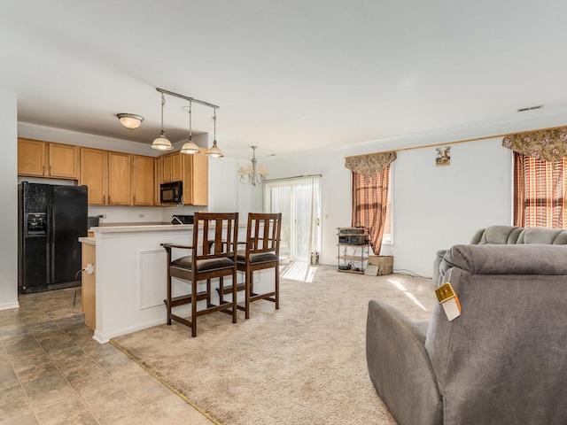 living area featuring a chandelier, crown molding, and visible vents