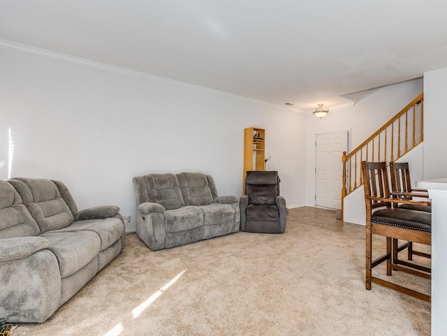 carpeted living area featuring stairway and ornamental molding