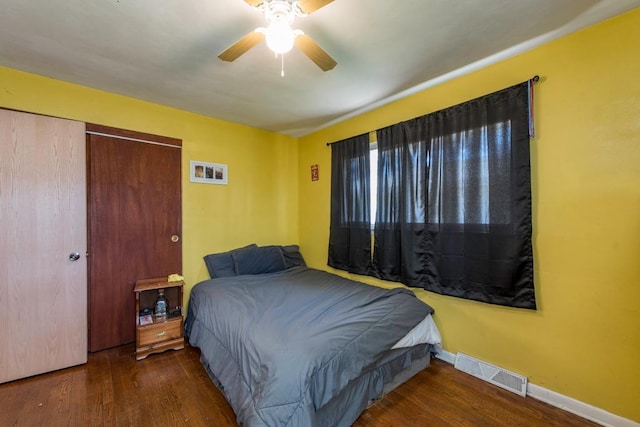 2214 Gilead Ave, Zion, IL 60099 - bedroom with visible vents, ceiling fan, wood finished floors, and baseboards