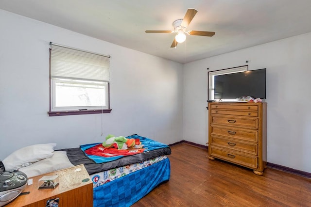 2214 Gilead Ave, Zion, IL 60099 - bedroom featuring ceiling fan, wood finished floors, and baseboards