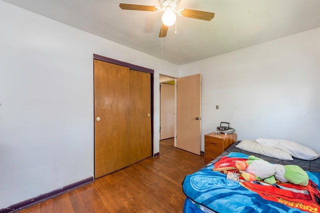 2214 Gilead Ave, Zion, IL 60099 - bedroom with baseboards, wood finished floors, a ceiling fan, and a closet