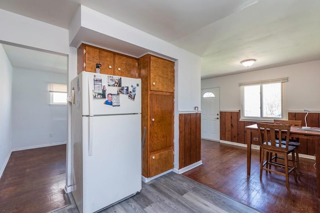 2214 Gilead Ave, Zion, IL 60099 - kitchen featuring dark wood finished floors, wainscoting, brown cabinetry, and freestanding refrigerator