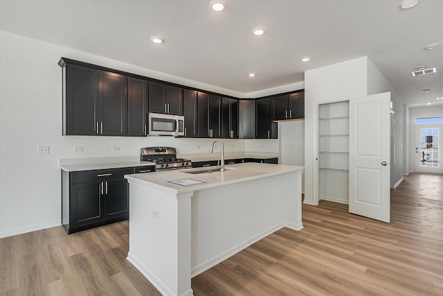 4 Harborside Way, Hawthorn Woods, IL 60047 - kitchen featuring a sink, light wood finished floors, visible vents, and appliances with stainless steel finishes