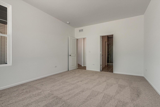 4 Harborside Way, Hawthorn Woods, IL 60047 - unfurnished bedroom with baseboards, visible vents, carpet floors, and connected bathroom