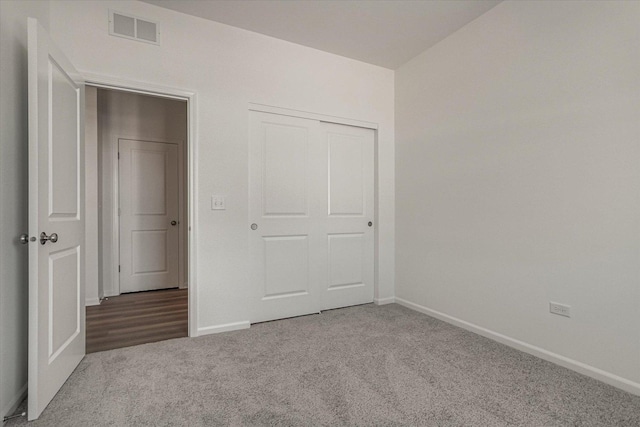4 Harborside Way, Hawthorn Woods, IL 60047 - unfurnished bedroom with baseboards, visible vents, a closet, and carpet