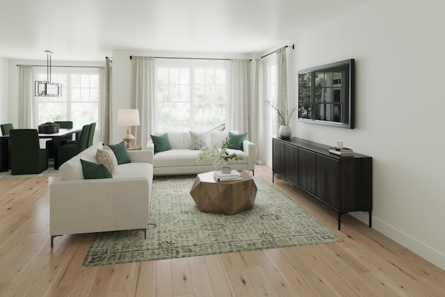 3 Harborside Way, Hawthorn Woods, IL 60047 - living area featuring light wood-style flooring and a chandelier