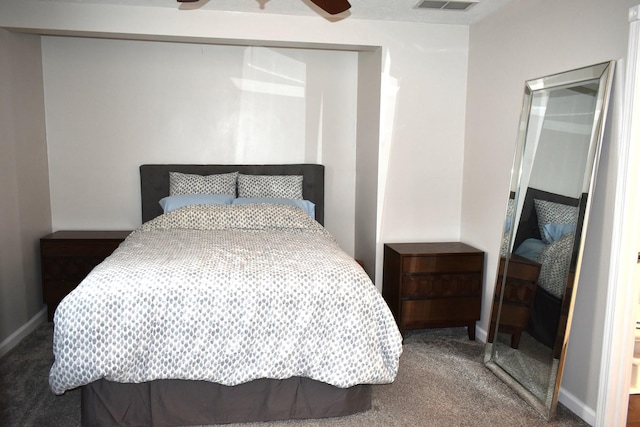 bedroom with carpet flooring, baseboards, a ceiling fan, and visible vents