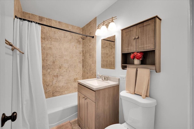 bathroom with toilet, shower / bath combo, and vanity