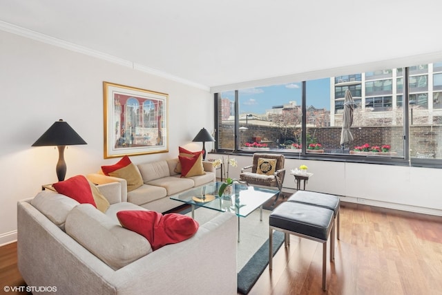 1555 N Sandburg Ter Unit 115K, Chicago, IL 60610 - living room featuring a view of city, wood finished floors, and ornamental molding