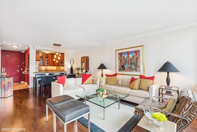 1555 N Sandburg Ter Unit 115K, Chicago, IL 60610 - living area featuring dark wood-type flooring, ornamental molding, and indoor wet bar