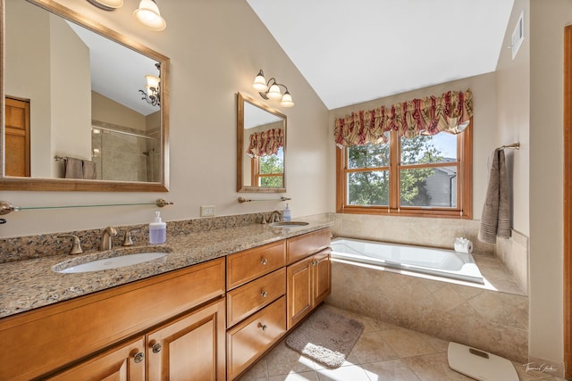 bathroom featuring vaulted ceiling, tile patterned floors, double vanity, a garden tub, and an enclosed shower