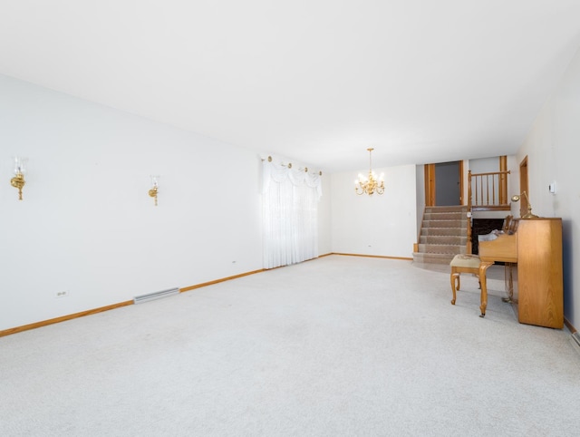 unfurnished living room with an inviting chandelier, stairs, baseboards, and visible vents