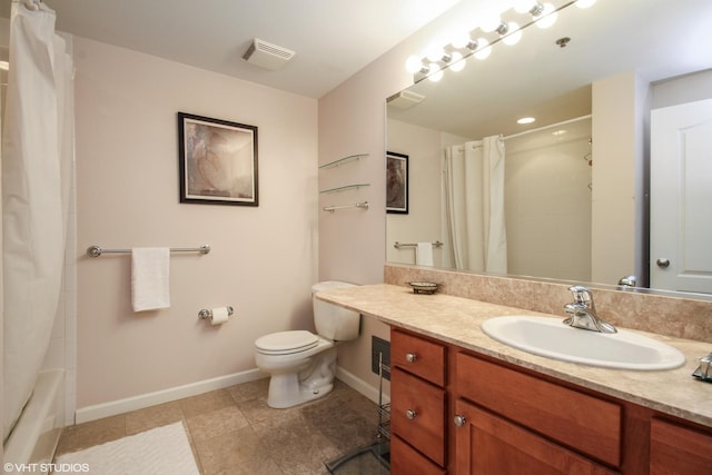full bath featuring baseboards, toilet, vanity, and tile patterned flooring