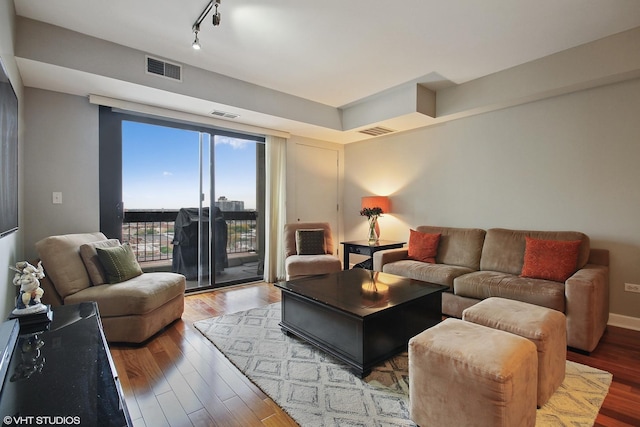 living area with wood finished floors