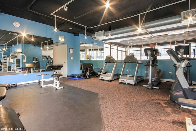 gym with rail lighting
