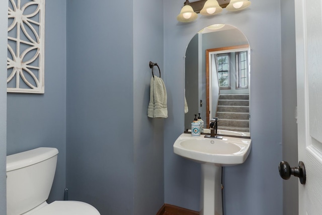 half bathroom with toilet
