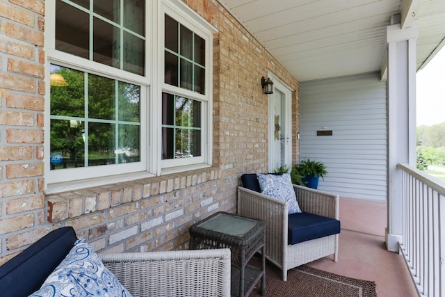 balcony featuring a porch