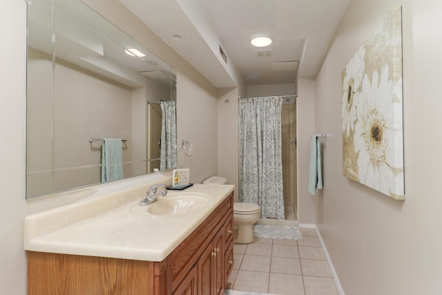 bathroom with vanity, tile patterned flooring, curtained shower, toilet, and baseboards