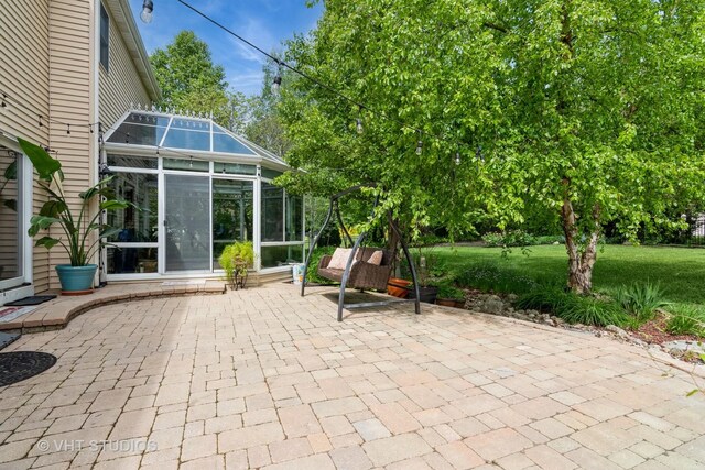 38W424 Berquist Dr, Geneva, IL 60134 - view of patio / terrace with a sunroom