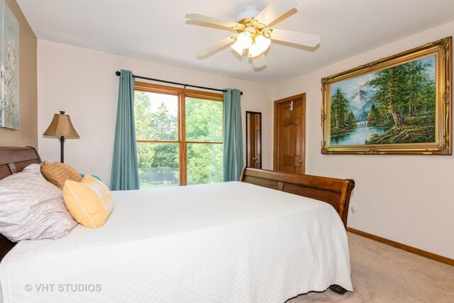 38W424 Berquist Dr, Geneva, IL 60134 - bedroom featuring baseboards, light carpet, and ceiling fan