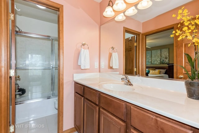 38W424 Berquist Dr, Geneva, IL 60134 - full bathroom with vanity, bath / shower combo with glass door, toilet, and tile patterned floors