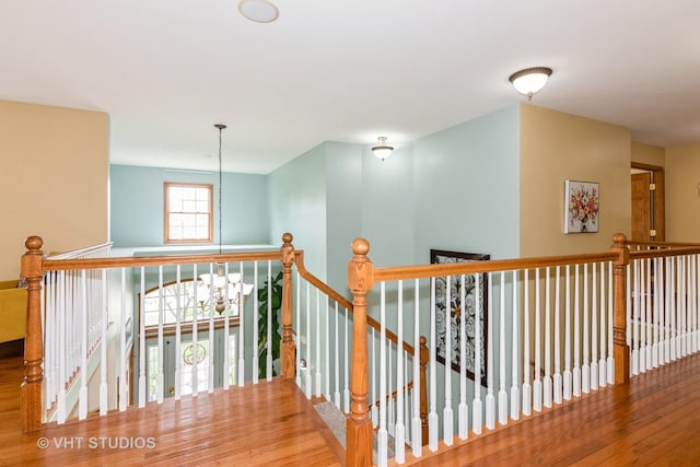 38W424 Berquist Dr, Geneva, IL 60134 - hallway featuring an upstairs landing and wood finished floors
