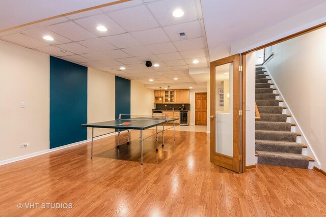 38W424 Berquist Dr, Geneva, IL 60134 - recreation room featuring beverage cooler, bar area, baseboards, light wood finished floors, and recessed lighting