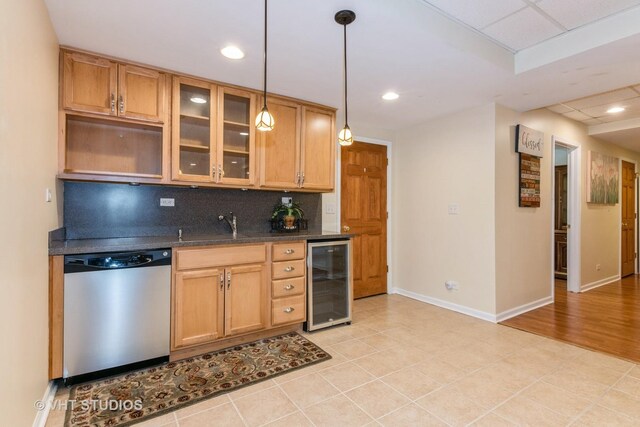 38W424 Berquist Dr, Geneva, IL 60134 - kitchen featuring dishwasher, beverage cooler, tasteful backsplash, glass insert cabinets, and a sink