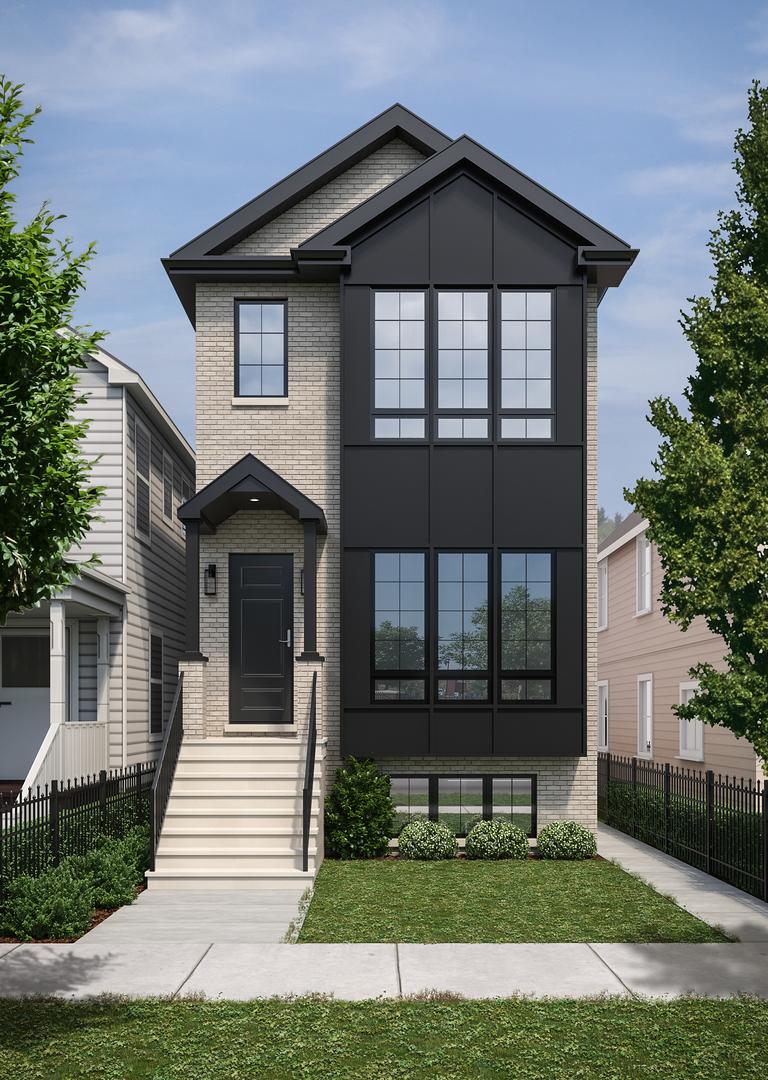 view of front facade with brick siding and fence