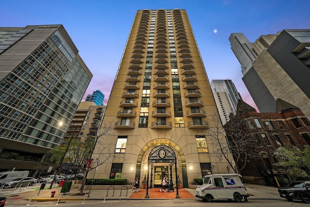 view of property at dusk