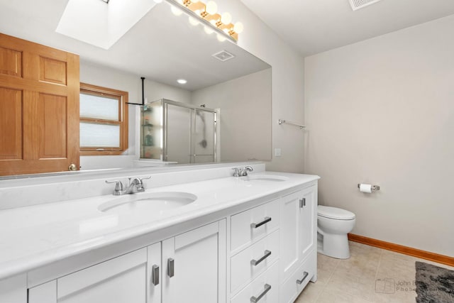 486 Devonaire Pkwy, Dekalb, IL 60115 - full bath featuring a skylight, double vanity, a stall shower, toilet, and tile patterned floors