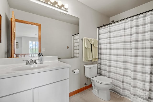 486 Devonaire Pkwy, Dekalb, IL 60115 - full bathroom featuring toilet, tile patterned flooring, vanity, and baseboards