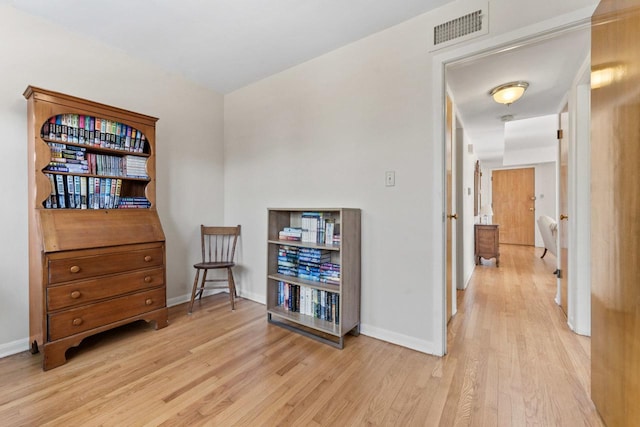 5927 W Addison St Unit 2D, Chicago, IL 60634 - living area featuring wood finished floors and baseboards