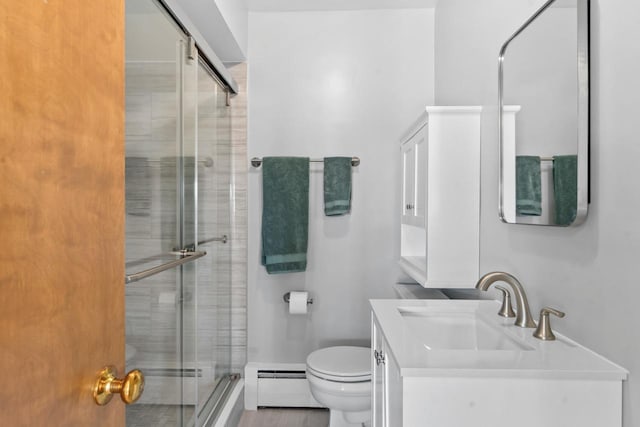 5927 W Addison St Unit 2D, Chicago, IL 60634 - full bathroom featuring a baseboard radiator, a stall shower, toilet, and vanity