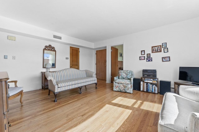 5927 W Addison St Unit 2D, Chicago, IL 60634 - living area featuring light wood finished floors