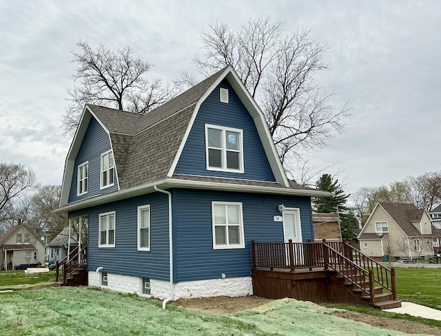 257 Orchard Ave, Kankakee, IL 60901 - rear view of property with a gambrel roof, stairs, a shingled roof, and a yard