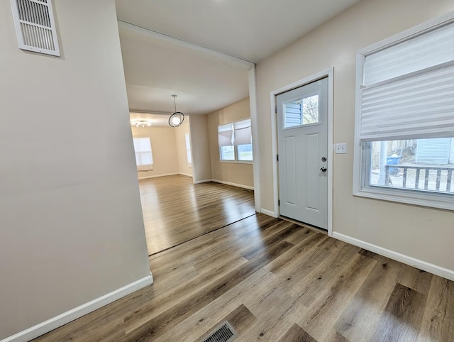 257 Orchard Ave, Kankakee, IL 60901 - foyer entrance featuring wood finished floors and baseboards