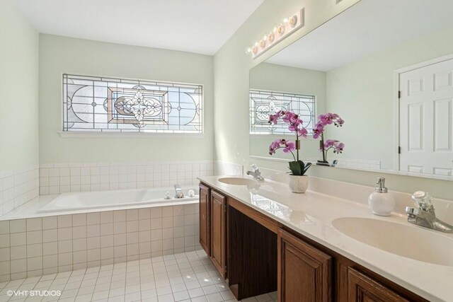 838 Old Checker Rd Unit D-4, Buffalo Grove, IL 60089 - full bathroom featuring a garden tub, double vanity, and tile patterned flooring