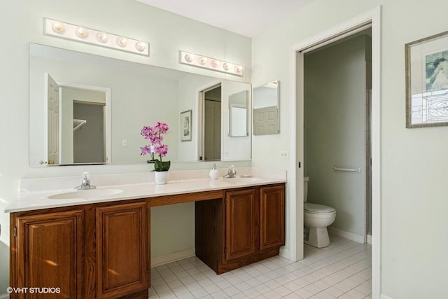 838 Old Checker Rd Unit D-4, Buffalo Grove, IL 60089 - full bathroom featuring tile patterned flooring, double vanity, toilet, and baseboards