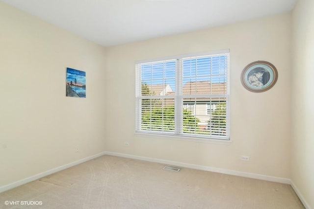 838 Old Checker Rd Unit D-4, Buffalo Grove, IL 60089 - empty room featuring baseboards and light colored carpet