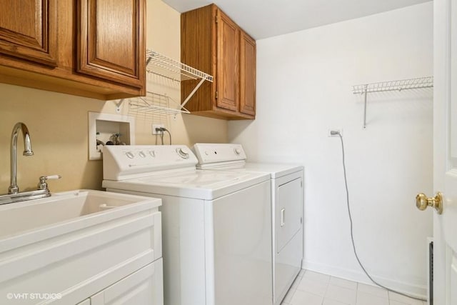838 Old Checker Rd Unit D-4, Buffalo Grove, IL 60089 - washroom with washing machine and dryer, cabinet space, and light tile patterned floors