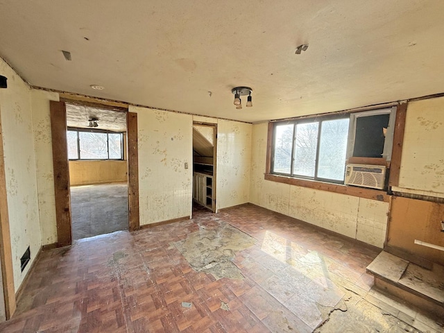 unfurnished bedroom with cooling unit