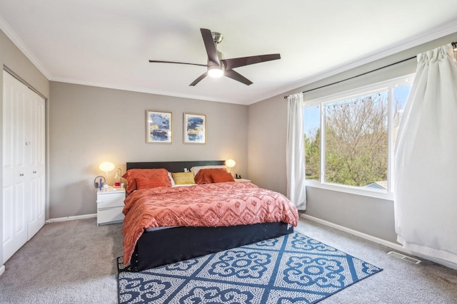 1462 Belle Haven Dr, Grayslake, IL 60030 - bedroom featuring carpet floors, baseboards, crown molding, a closet, and a ceiling fan