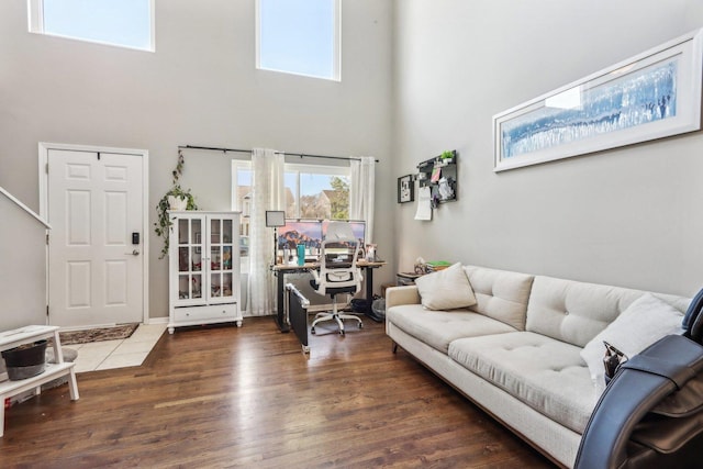 1462 Belle Haven Dr, Grayslake, IL 60030 - living area featuring a towering ceiling, a desk, and wood finished floors